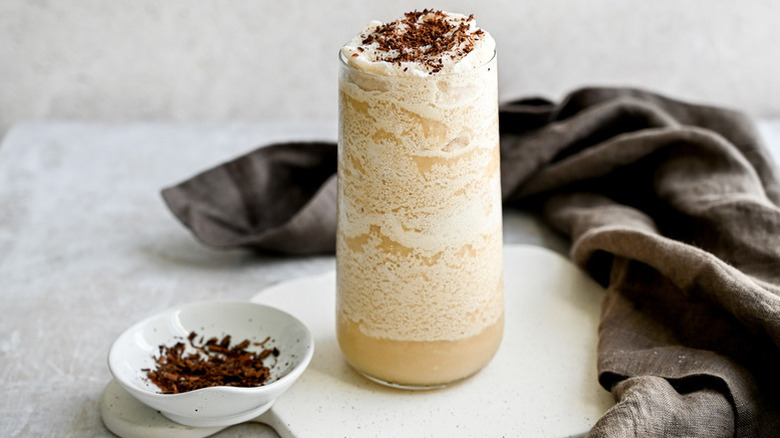 Creamy frozen alcoholic milkshake garnished with shaved chocolate