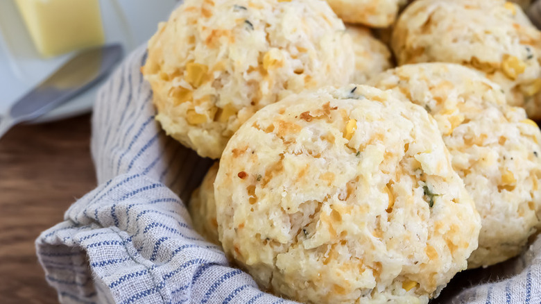 Sweet corn biscuits in linen-lined bowl