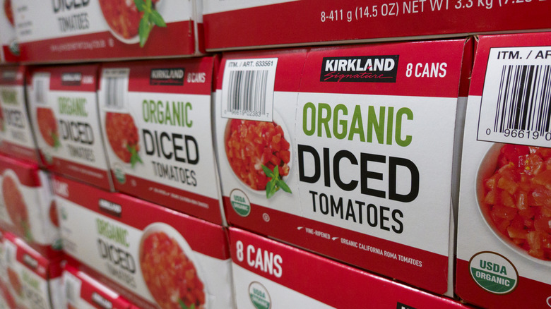 Rows of diced tomato boxes stacked on top of one another