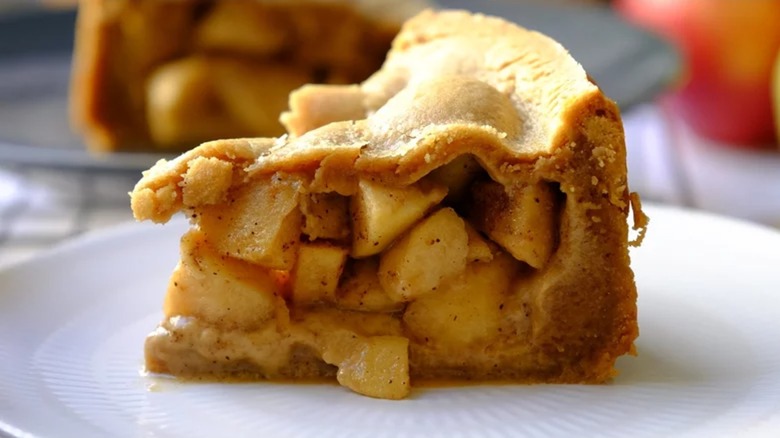 Slice of apple pie with cookie crust