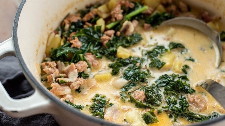 Pot of zuppa toscana soup with kale and potatoes