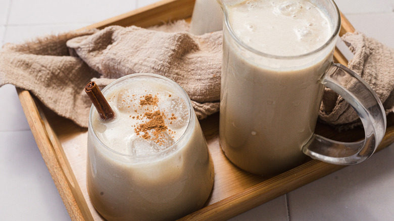 Glass and pitcher of horchata