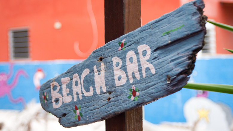rustic beach bar sign