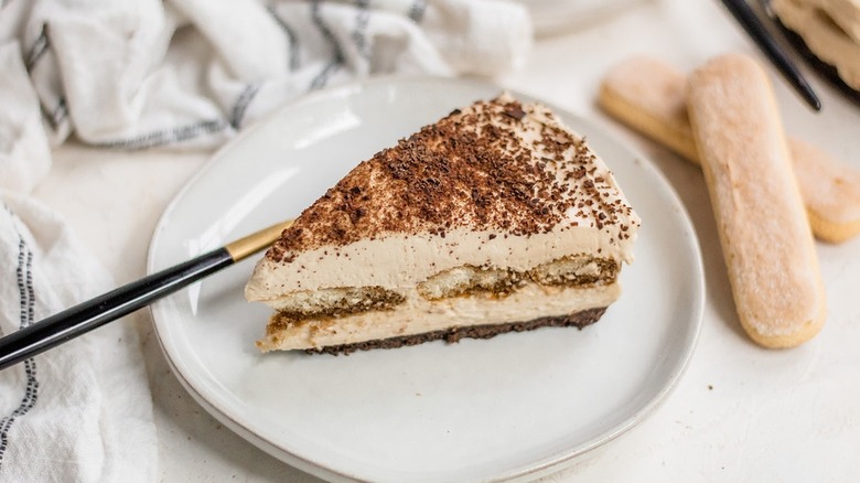 tiramisu cheesecake slice on plate