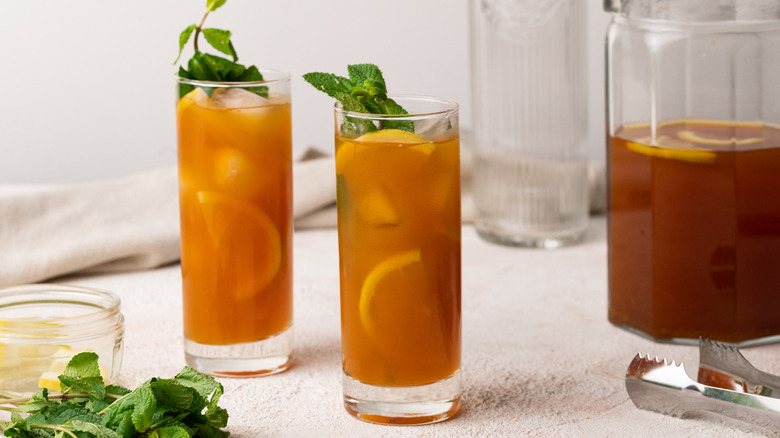 two glasses with tea 