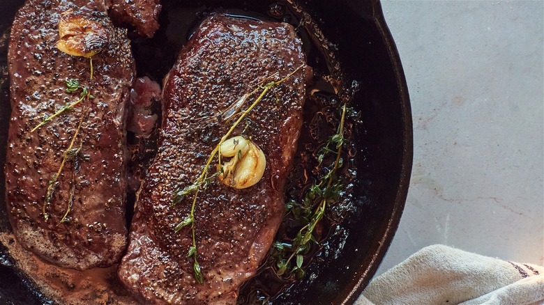 steak in cast iron skillet