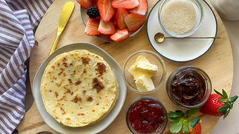 fruit, jam, and chocolate sauce