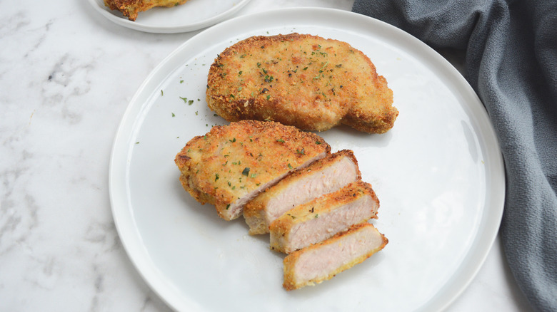 sliced pork chop on plate