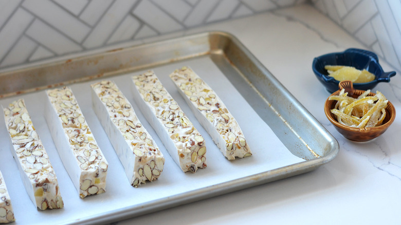 nougat slices on lined baking dish