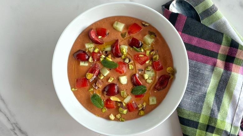 bowl of gazpacho with garnishes