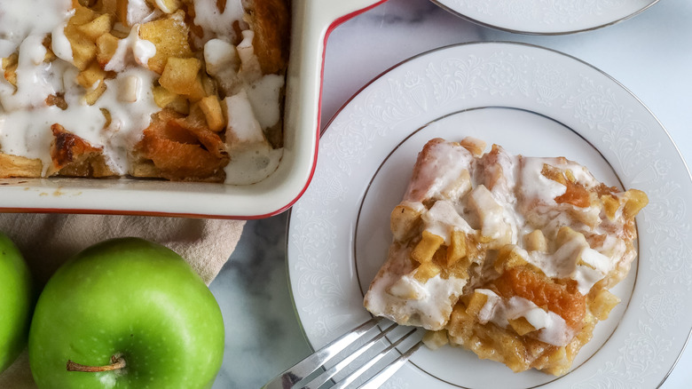 Slice of apple fritter breakfast casserole on a plate