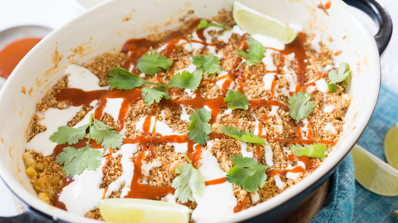 Bang bang corn casserole on blue napkin