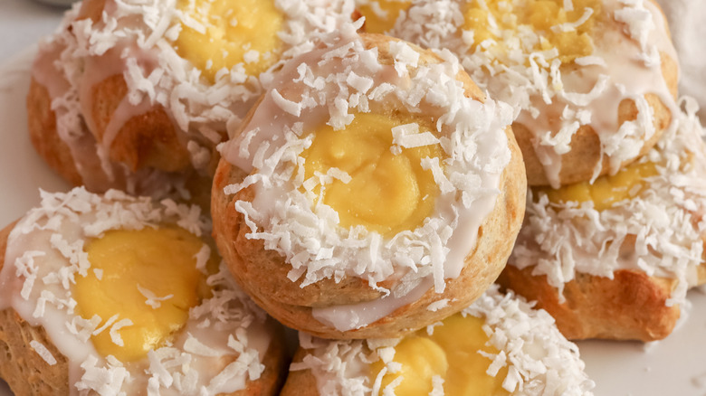 sweet rolls with custard filling and coconut coating