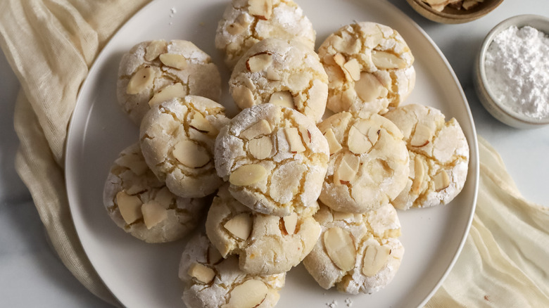 Sicilian almond cookies stacked on plate