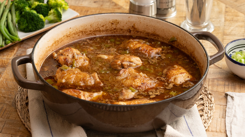 Cajun chicken stew in pot