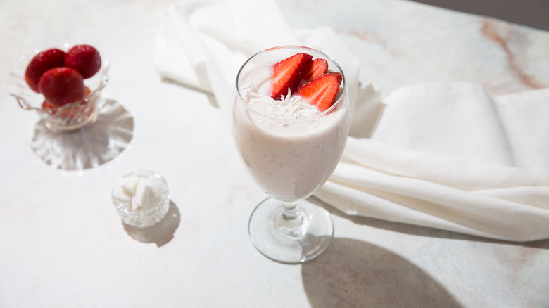 pink smoothie on white table