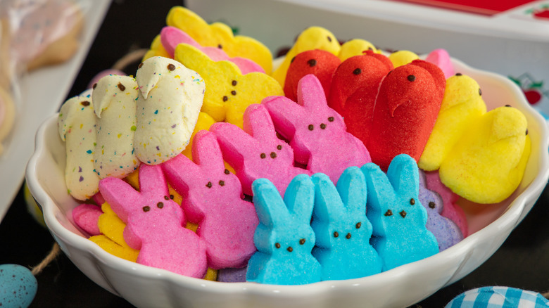 Bowl filled with different types of bunny and chick Peeps