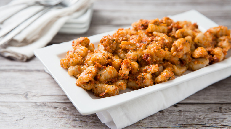 gnocchi with pesto on dish