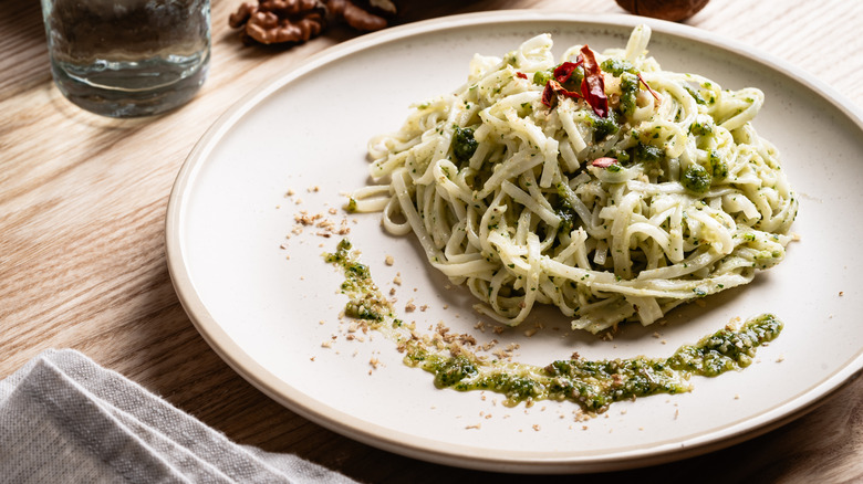 pasta with pesto on plate