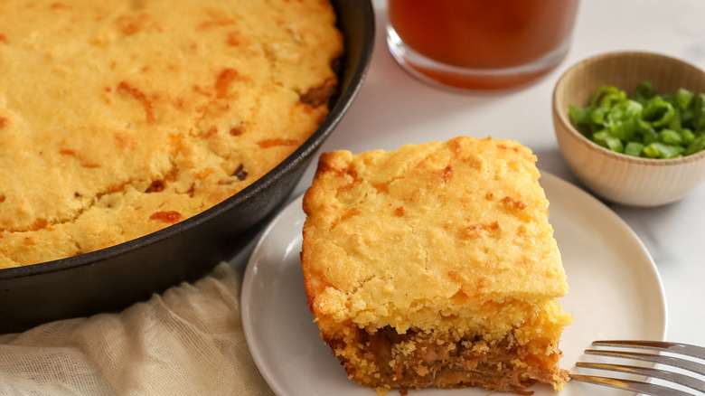 slice of barbecue pork-stuffed cornbread on plate