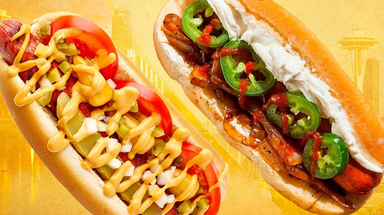 Chicago style hot dog on left with a Seattle hot dog on the right