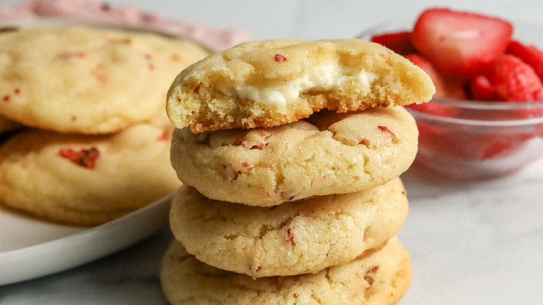 stack of cookies with the top one bitten into
