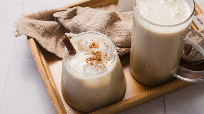 Glass and pitcher of horchata