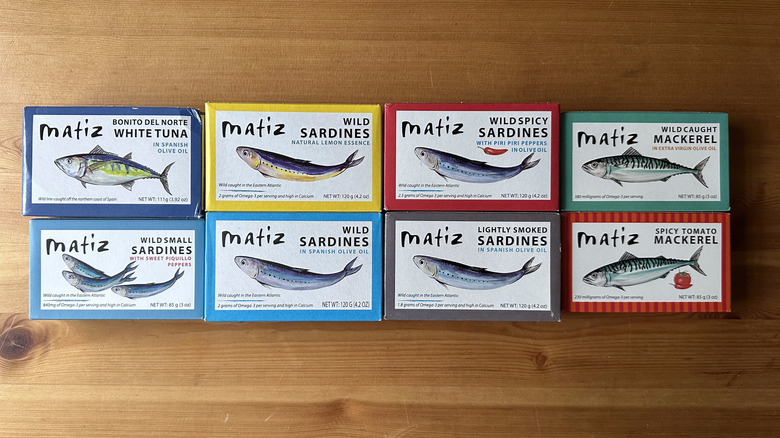 Matiz tinned fish boxes on wooden table