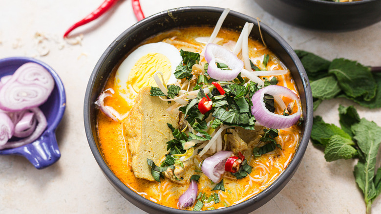 Layered bowl of chicken laksa