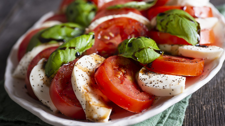 caprese salad on white plate