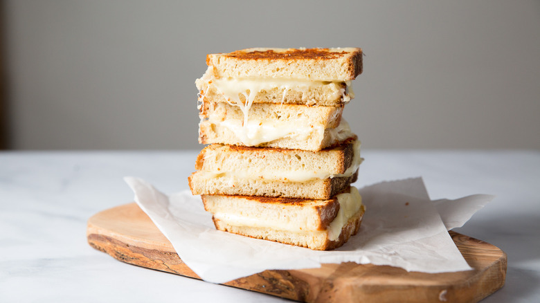 grilled cheese stacked on plate