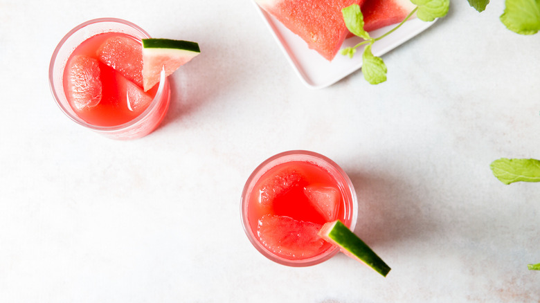 Watermelon old fashioned cocktails on table