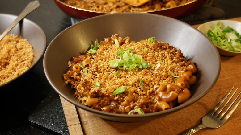 bowl of Hamburger Helper topped with toasted panko and scallions