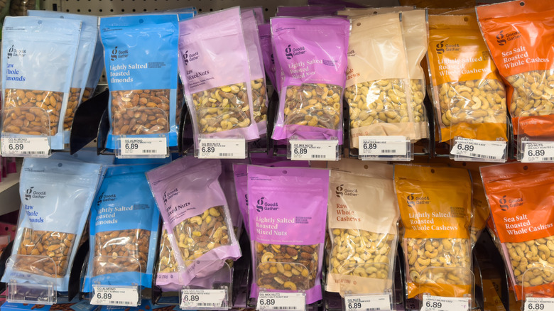 A variety of Good & Gather nuts on the shelves at Target