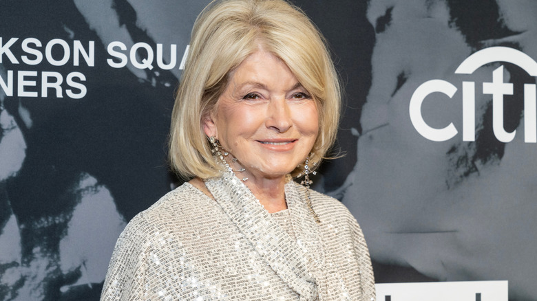 Martha Stewart at an event smiling at the camera