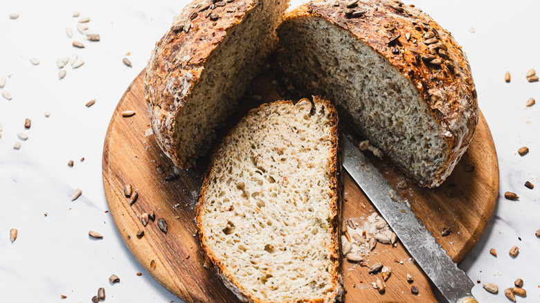 Bread loaf cut in two with slice taken out
