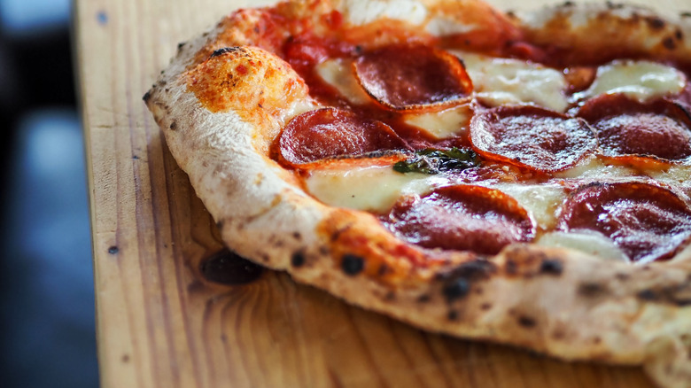 crispy, bubbly charred pizza