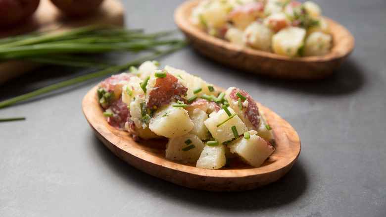 potato salad in wooden bowls
