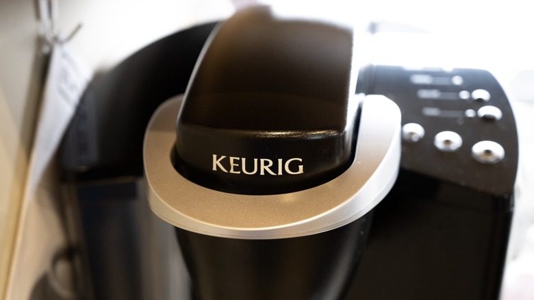 The front of a black Keurig machine