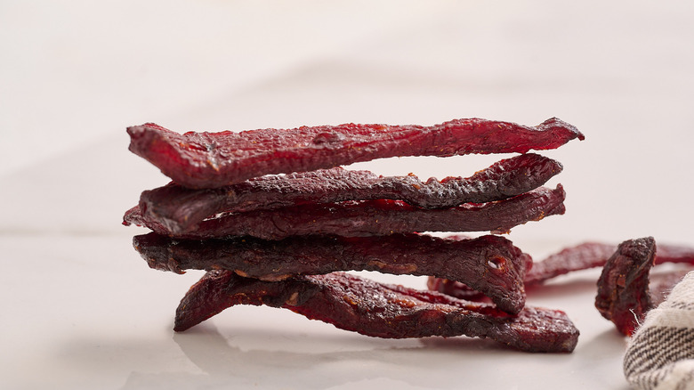 beef jerky stacked on a table