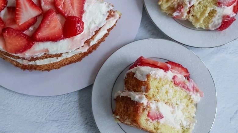 Strawberry sponge cake slices on plates