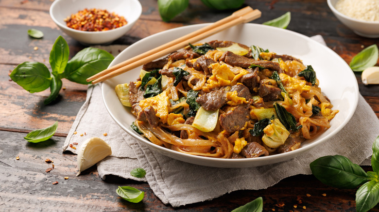 Pad see ew plated at a Thai restaurant