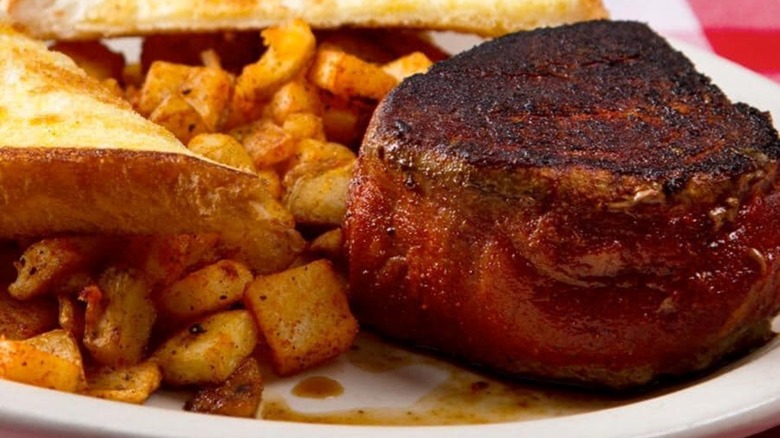 Herman's Ribhouse's steak and potatoes