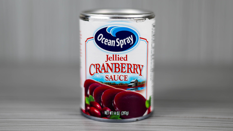 Can of Ocean Spray jellied cranberry sauce on gray background
