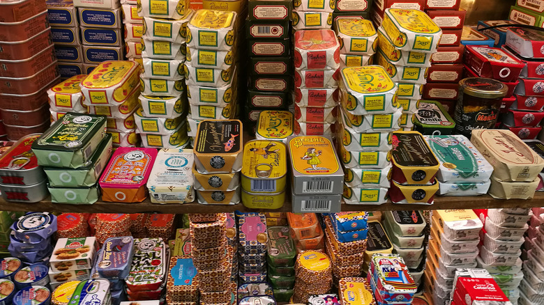 Tins of fish stacked at the Maninha Sardinha store