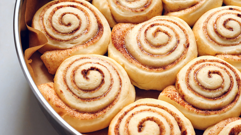 Canned cinnamon rolls arranged in a cheesecake pan