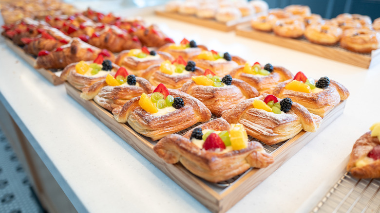 A selection of bakery pastries on a white table