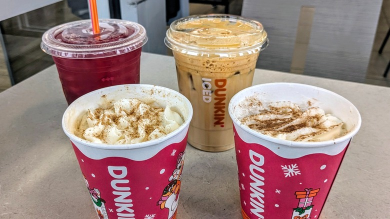 Dunkin's 2025 holiday menu drinks on table