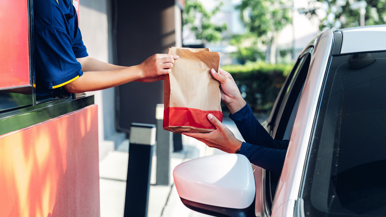 customer at fast food drive-thru