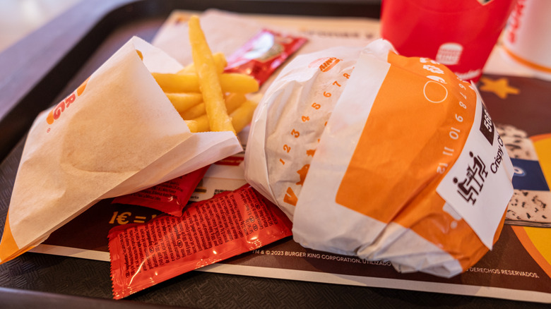 A Burger King sandwich with fries